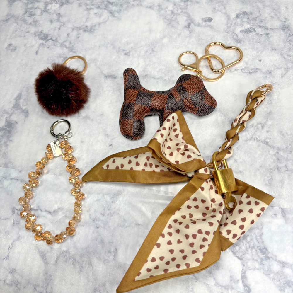 Authentic Louis Vuitton Gold Lock & Key 324 LV unbranded Bagcharm Mini Dog Brown